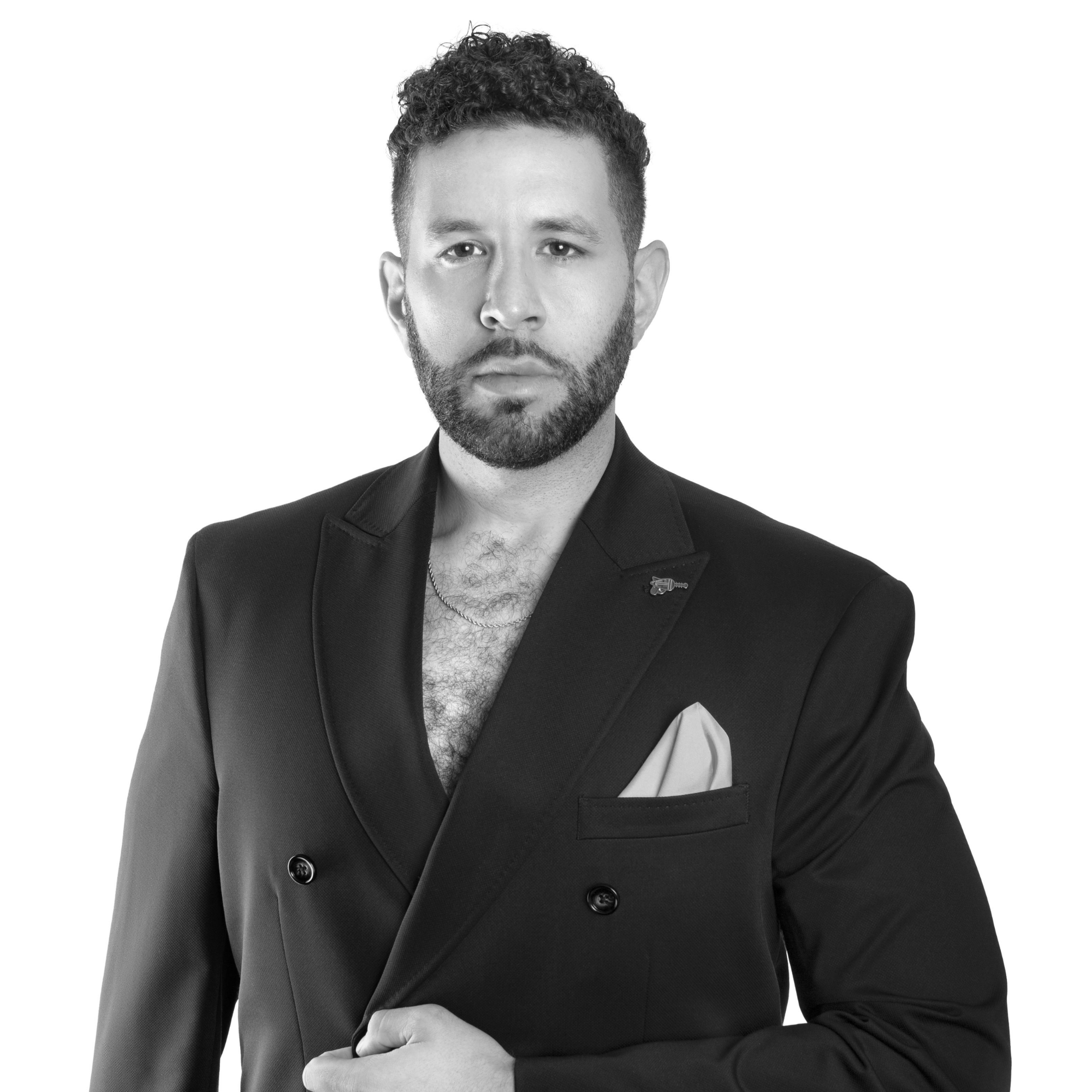 Black-and-white headshot of Kameron Lopreore.