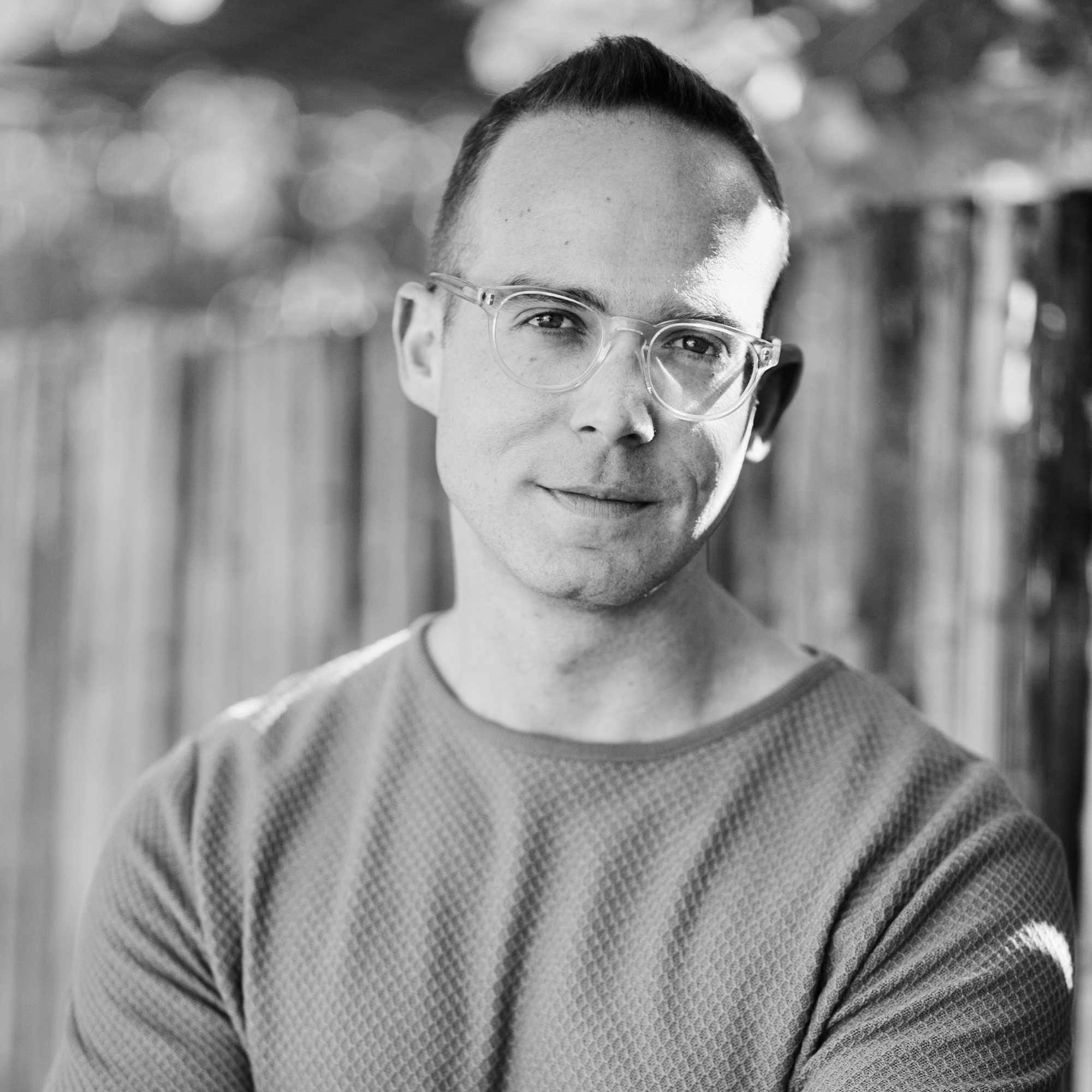 Black and white headshot of Christopher Allen.